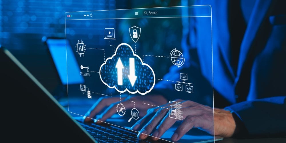 Cloud Computing and Data Technology Concept. Man using laptop with cloud icons and digital data symbol, representing cloud computing, data storage, cybersecurity, and AI integration in modern tech.
